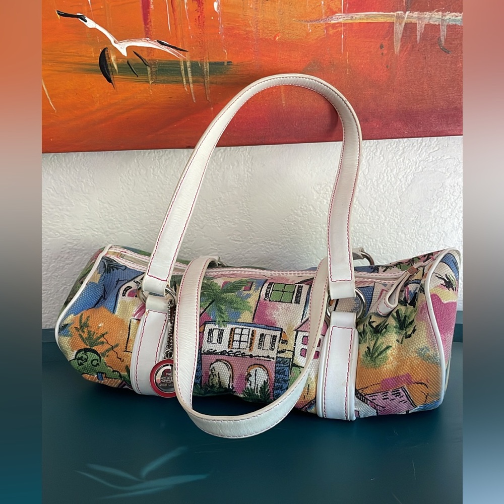 The Saks pink label tropical canvas barrel bag